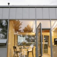 Modular home with sloping facade by Papundekl Architects
