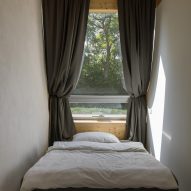 Modular home with sloping facade by Papundekl Architects