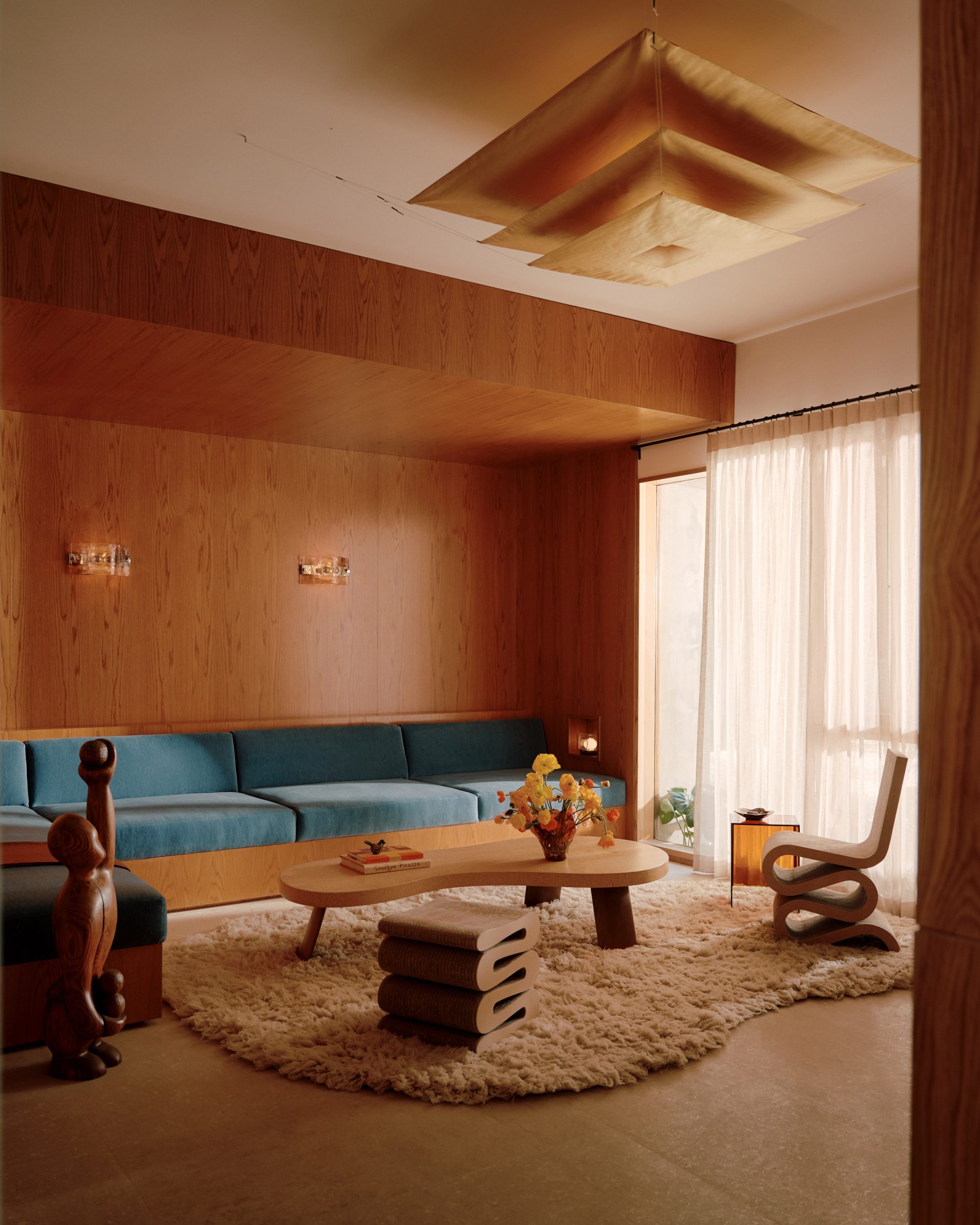Furniture including Frank Gehry's Wiggle Chair adds character to the renovated Los Angeles home