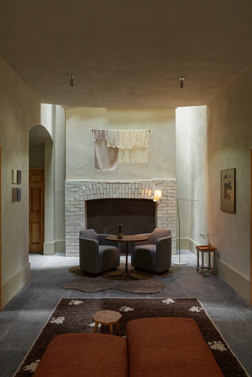 Fireplace against brick wall