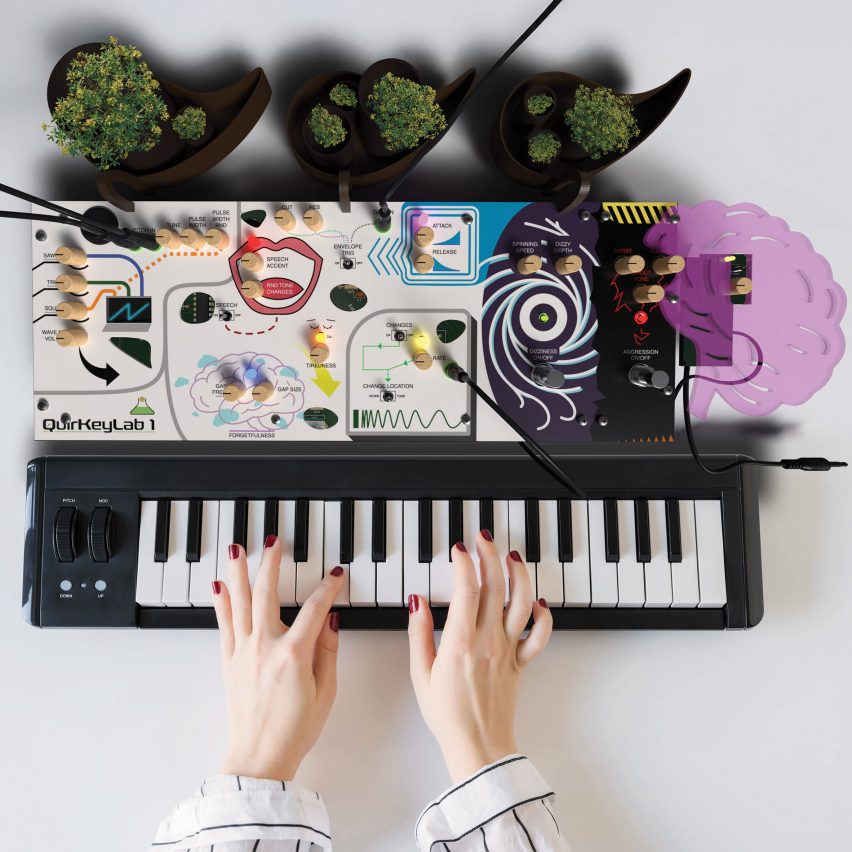 Hands playing keyboard with various attachments