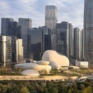 MAD scatters boulder-like galleries across green-roofed museum in Shenzhen