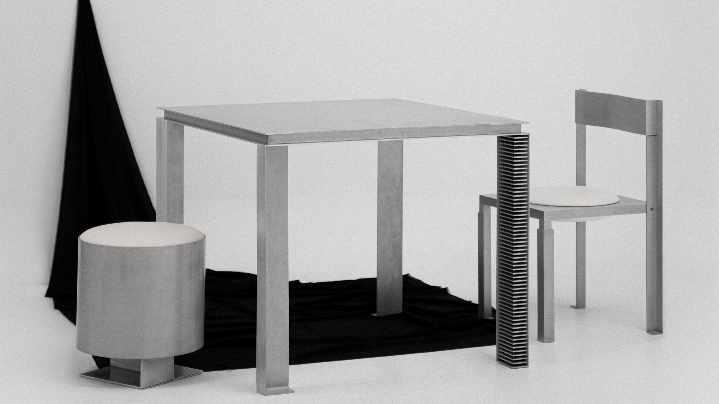 https://static.dezeen.com/uploads/2026/08/strut-table-pouf-yagmur-koylu-yet-design-studio-showroom_dezeen_2364_col_4.jpg