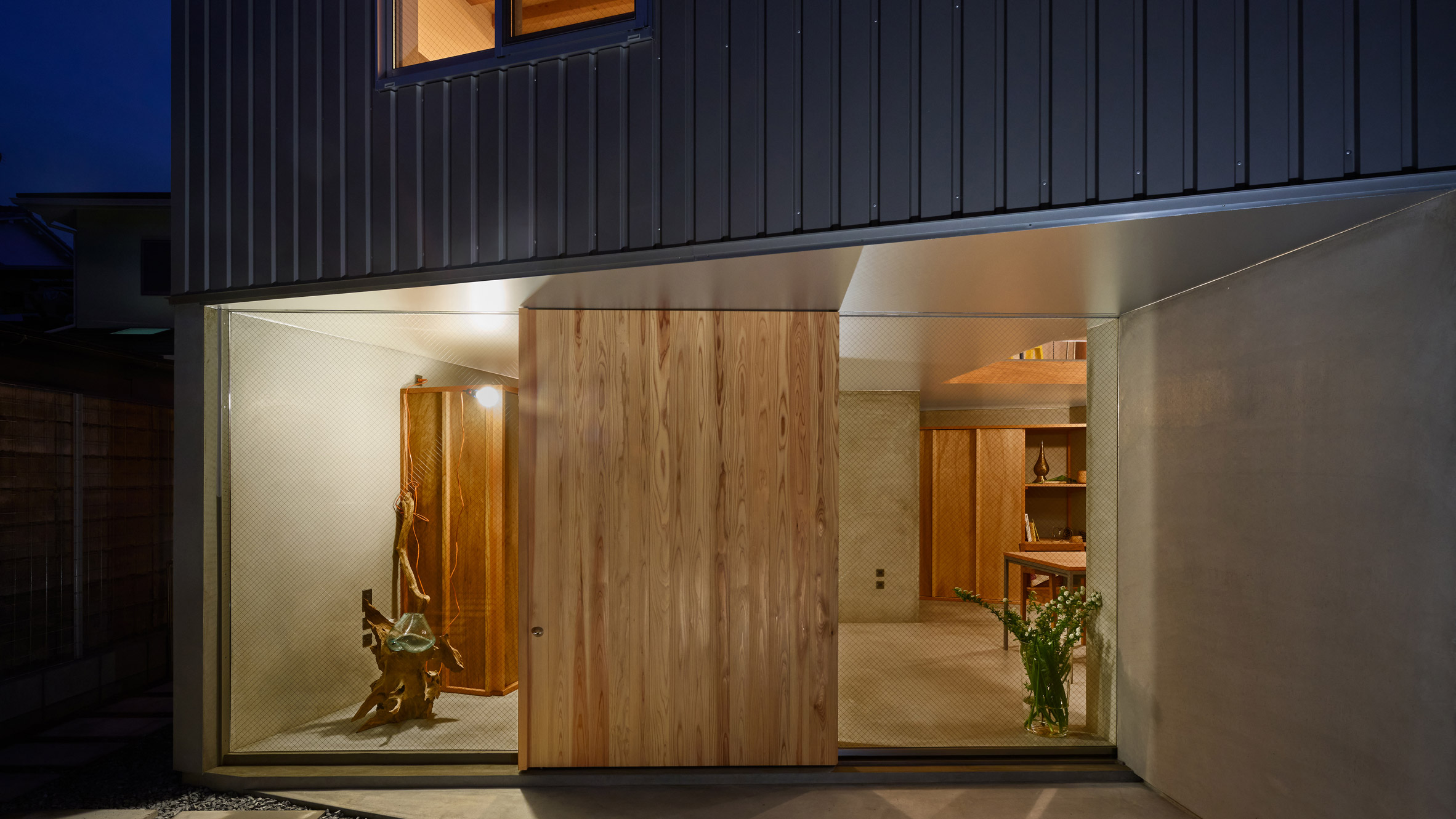 Entrance to Japanese house by Tato Architects