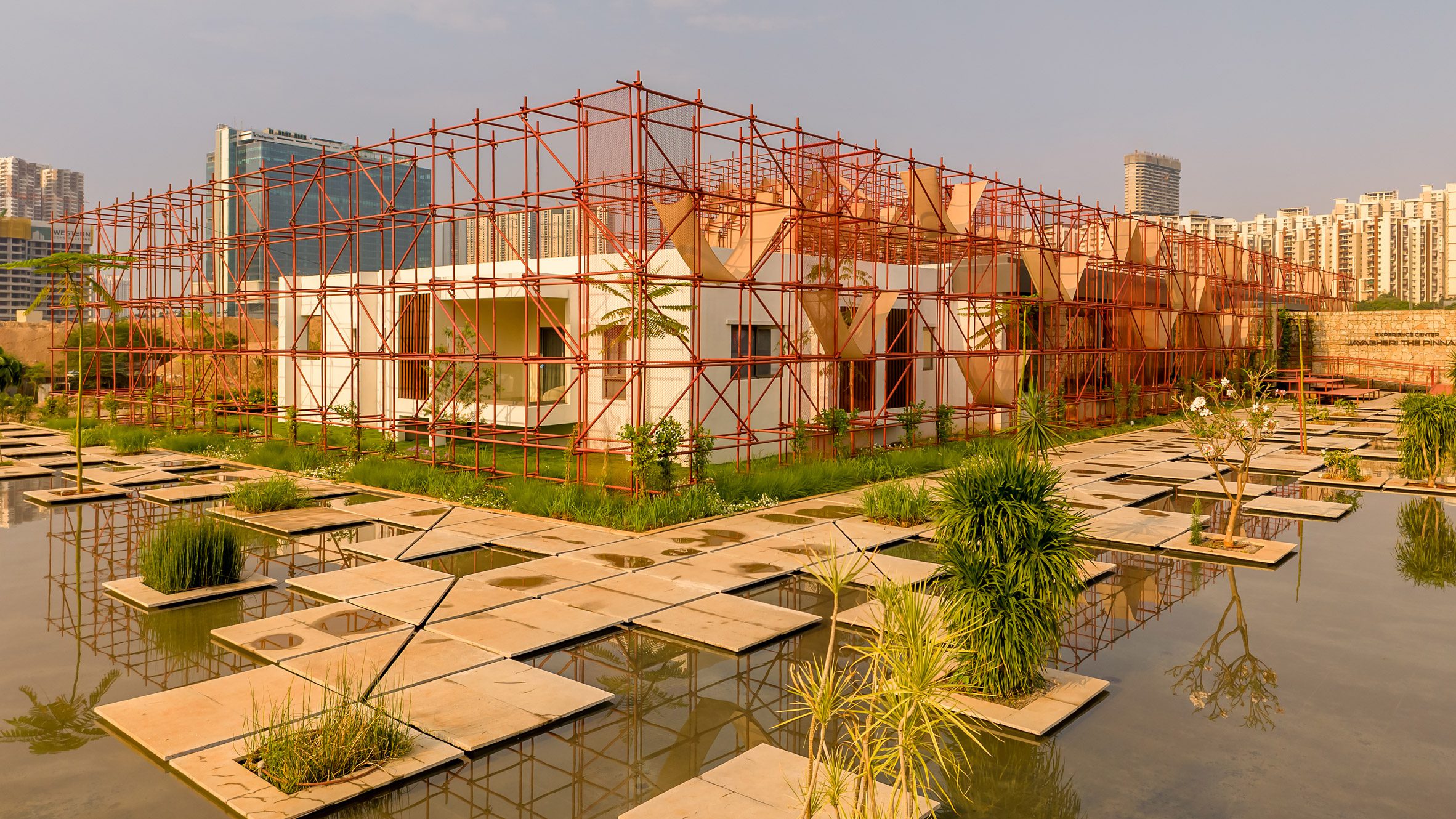 https://static.dezeen.com/uploads/2026/08/the-reclaimed-pavilion-kanan-modi-associates-india-hero_dezeen_2364_col_0.jpg