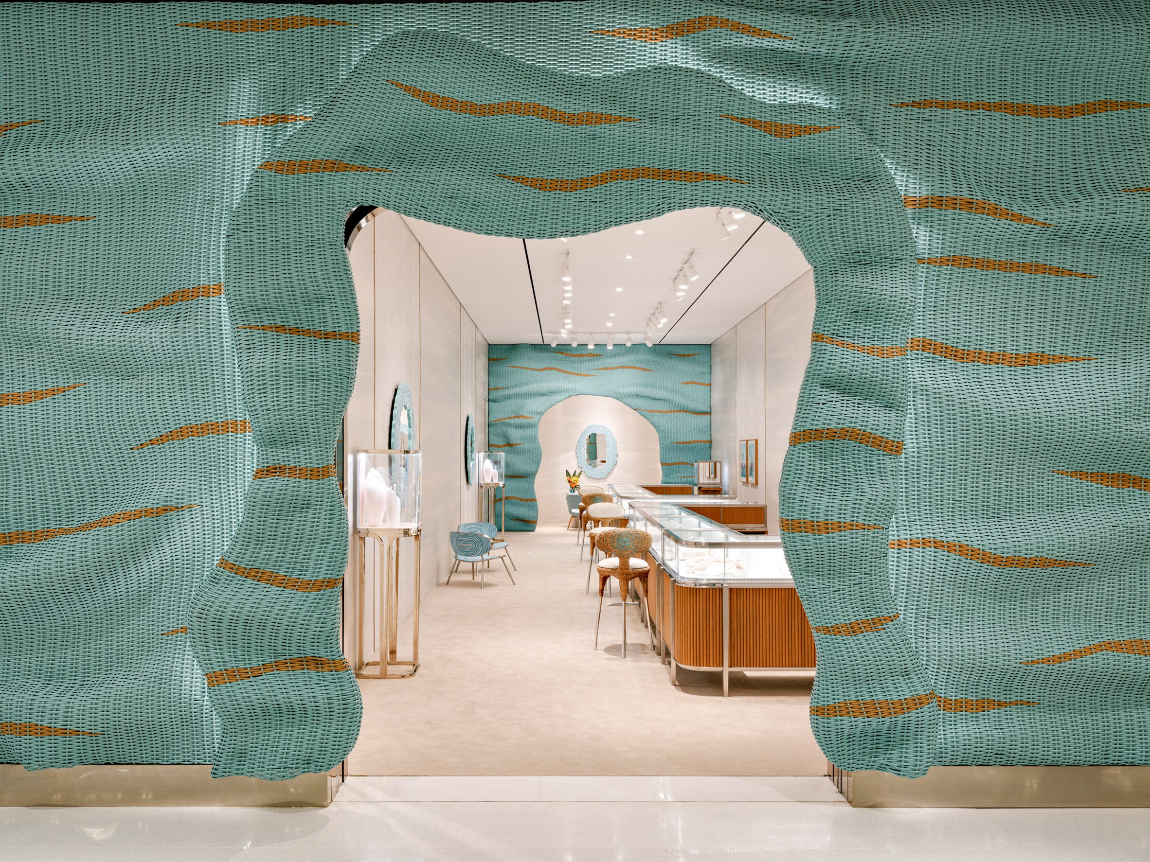 A woven wicker facade folds over around the entrance to the Tiffany & Co pop-up