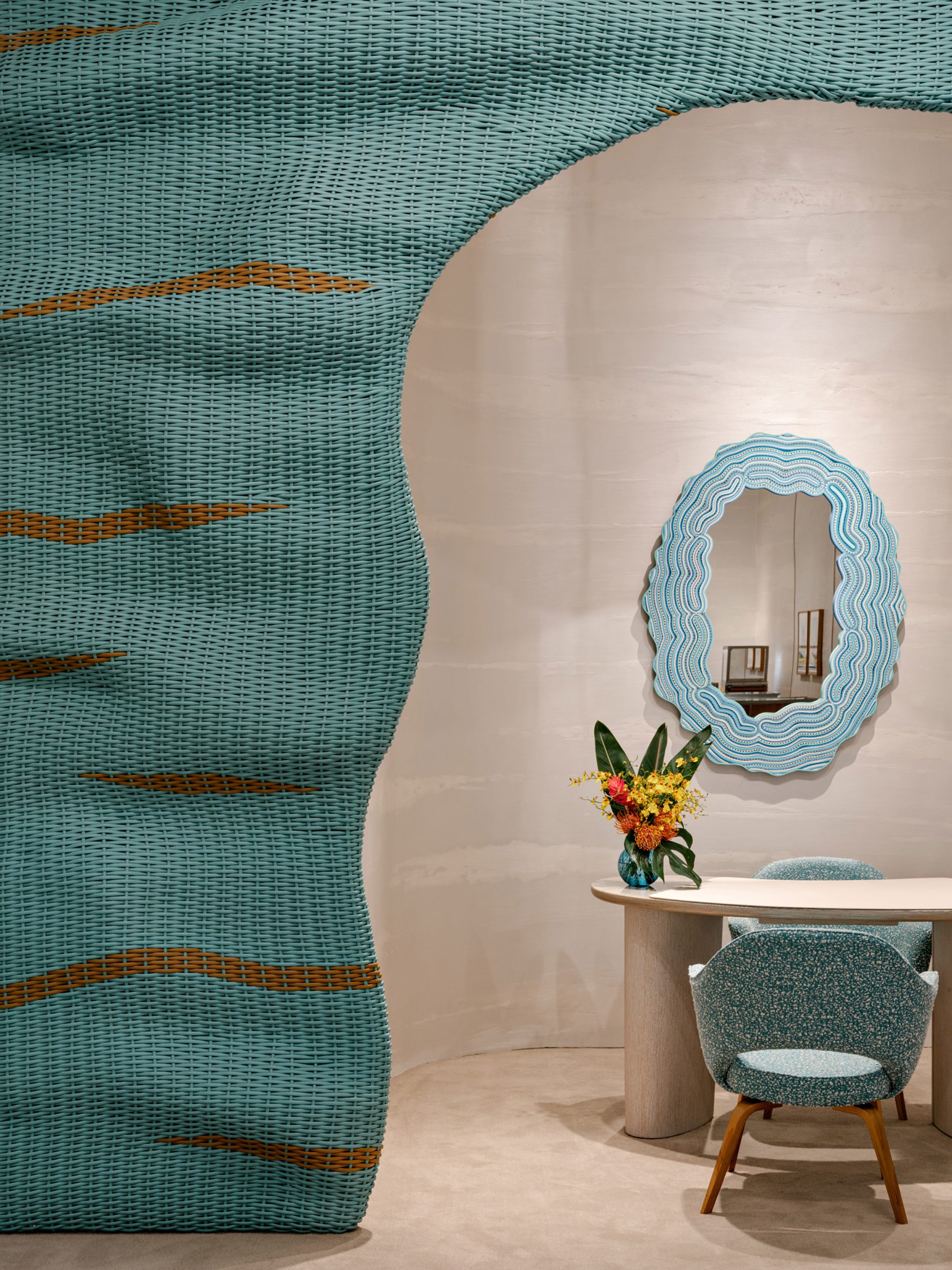 Wicker facade treatment applied around the entrance to a semi-private consultation area