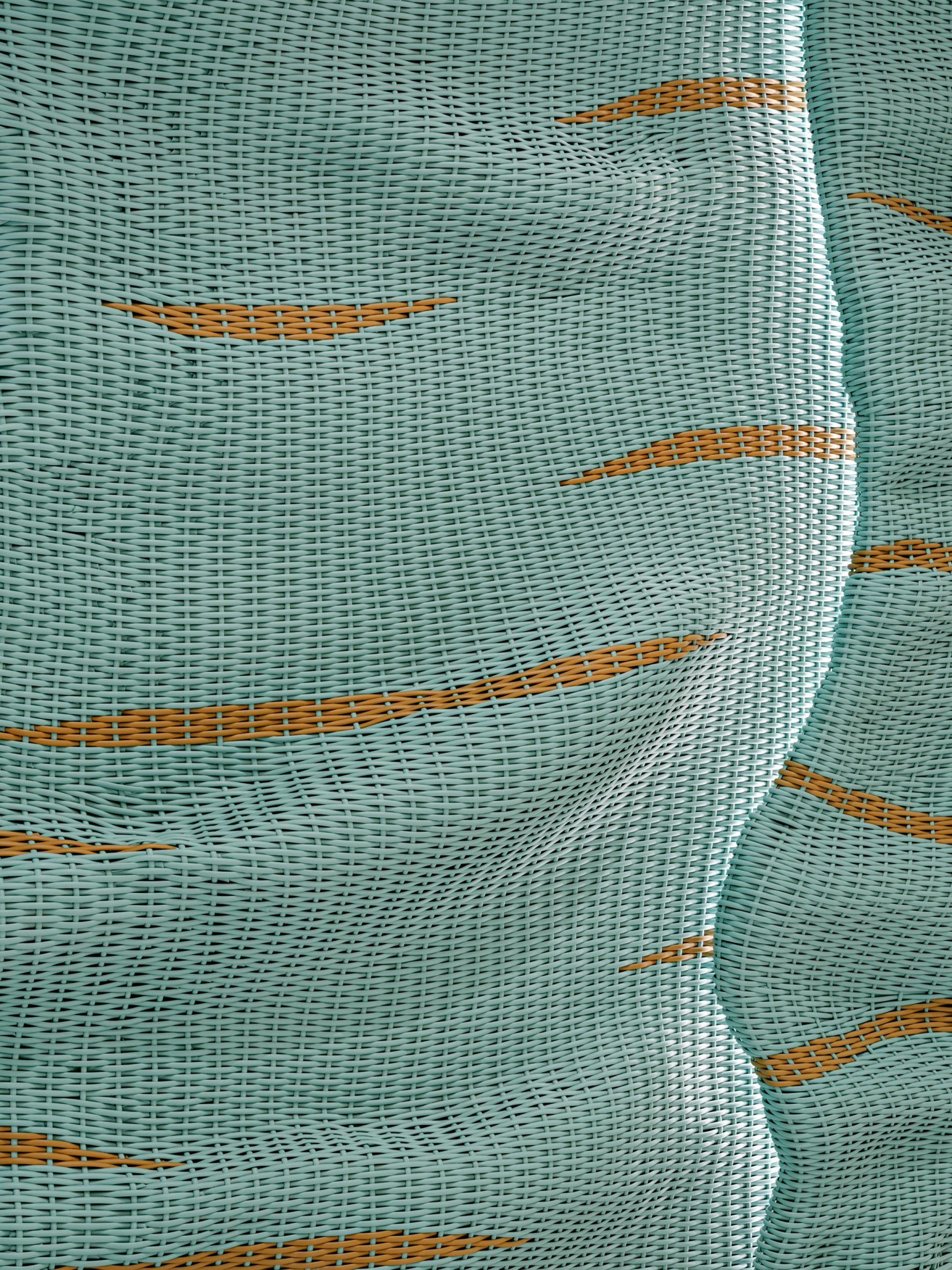 Streaks of tan run horizontally through an undulated blue material