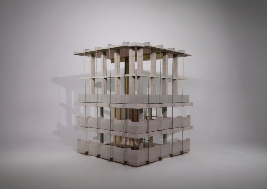 Photograph of an architectural model on a white backdrop