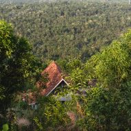 Ushas farmhouse nestled into a forested landscape in Kerala