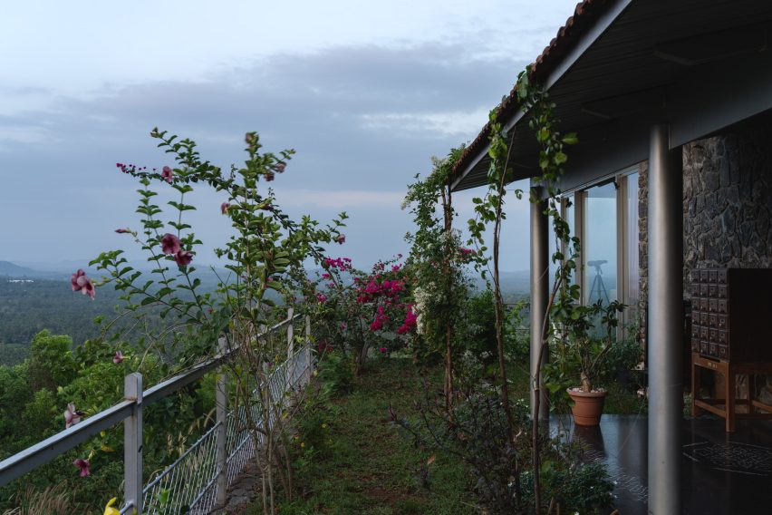 Covered terrace at Ushas farmhouse overlooking the Kerala landscape