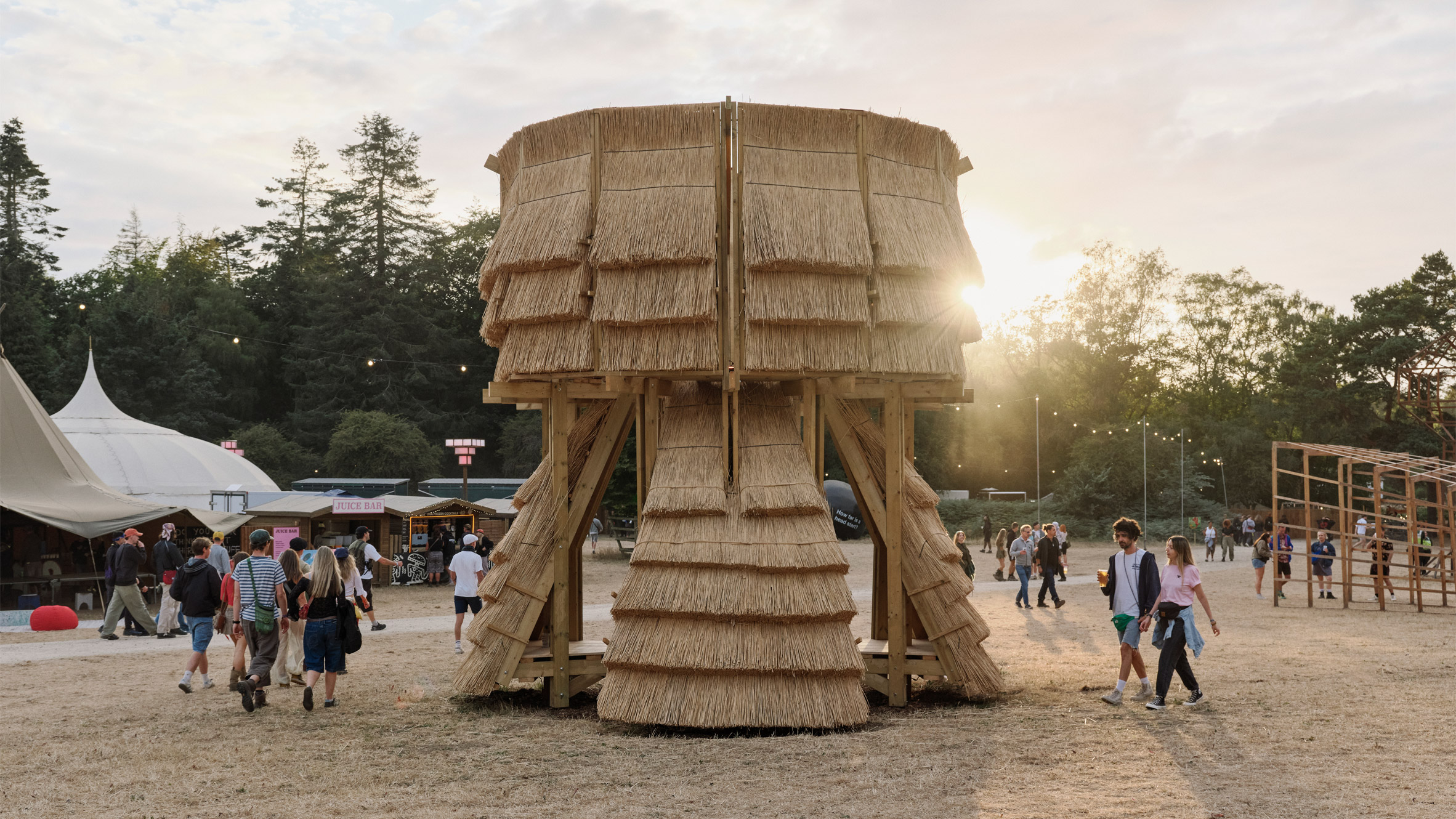 https://static.dezeen.com/uploads/2026/08/water-tower-thatch-installation-cella-collective-mitre-mondays-houghton-festival_dezeen_2364_hero_1.jpg