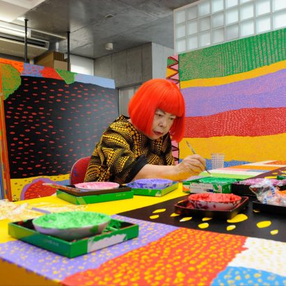 Yayoi Kusama working in her studio