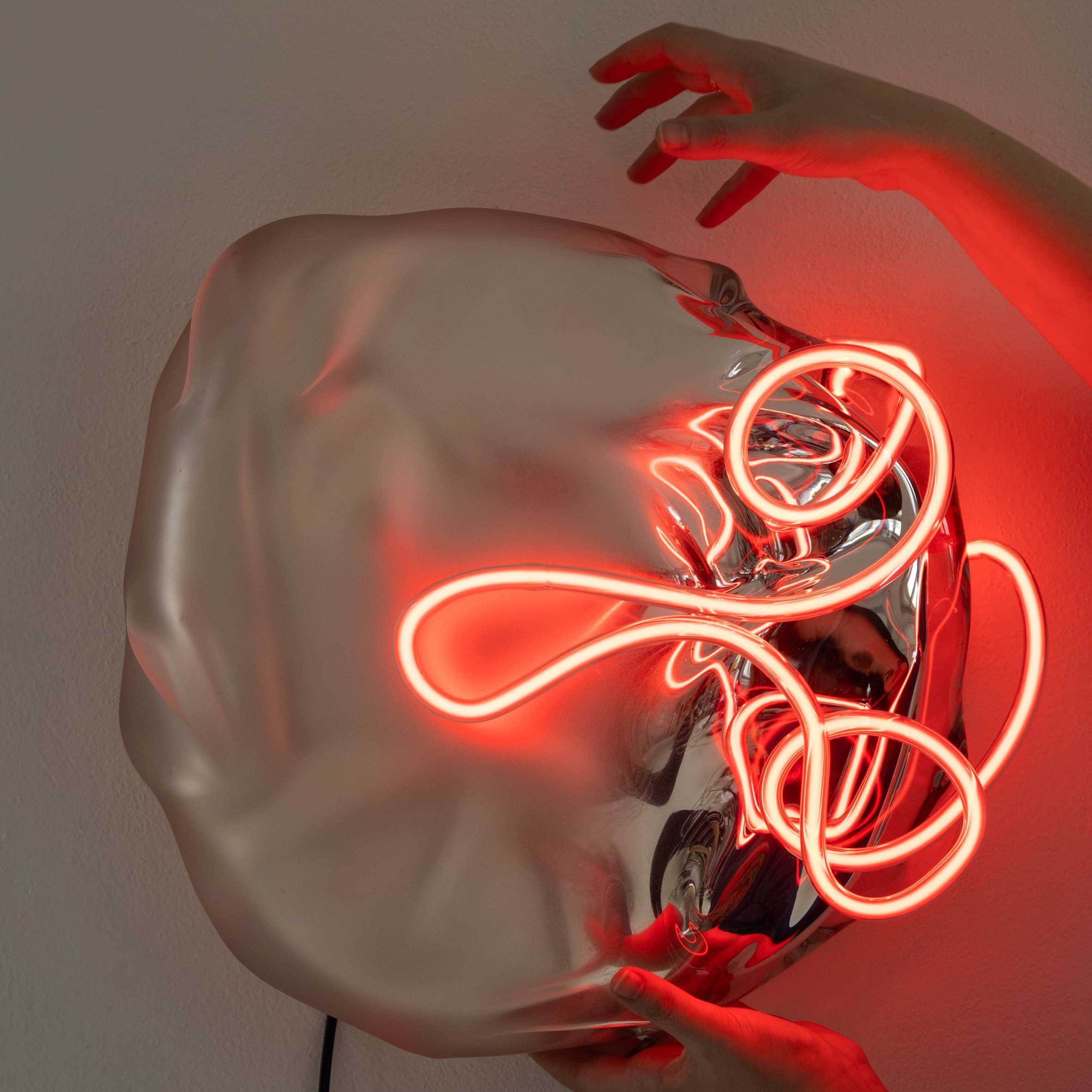 Photo of neon and glass light