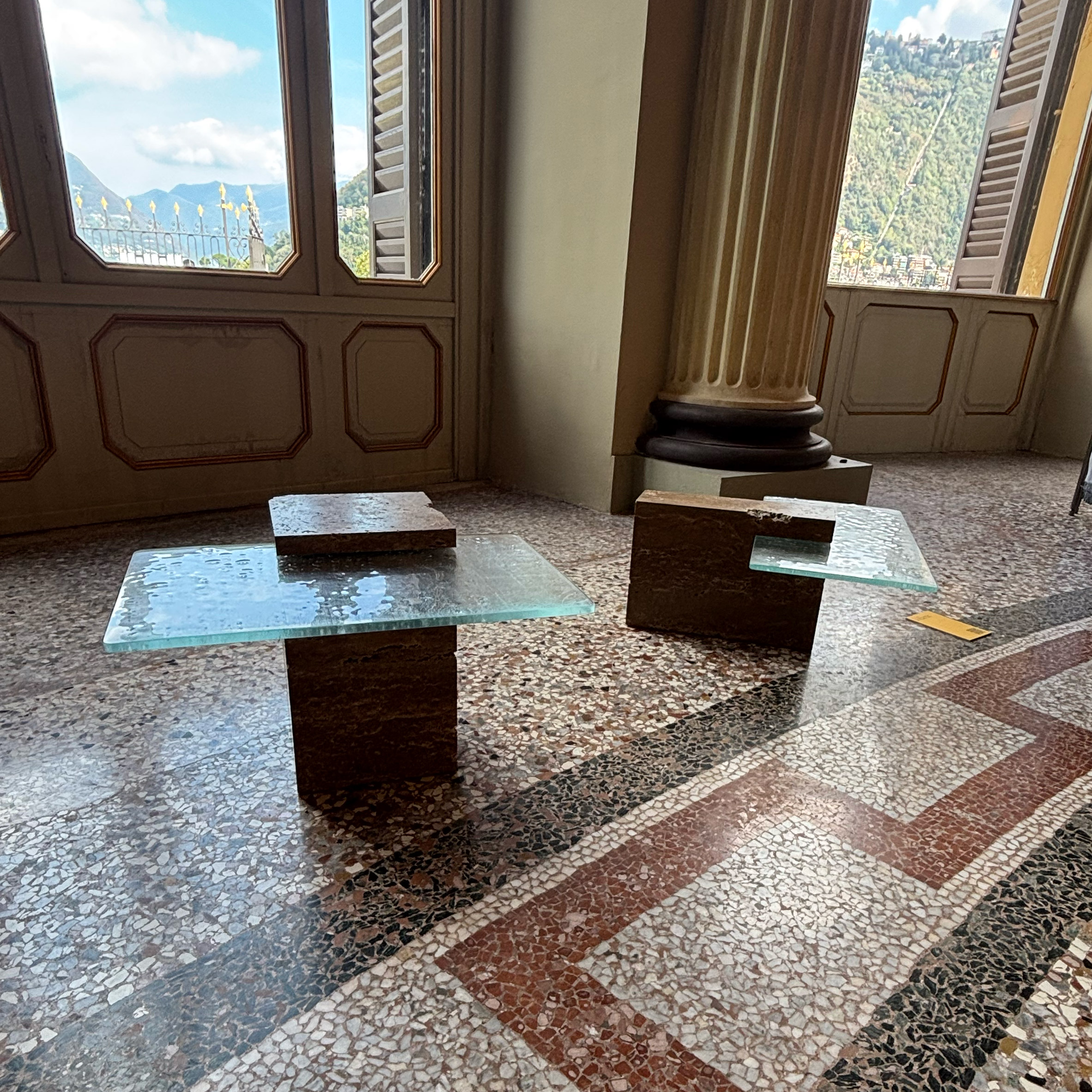Photo of travertine and glass tables