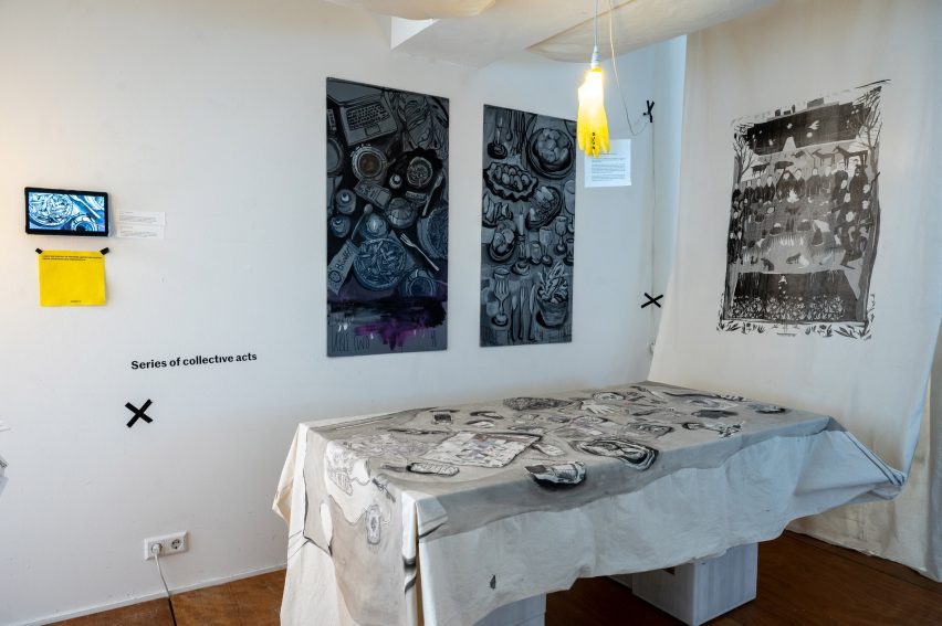 A gallery based in a corner of a white room