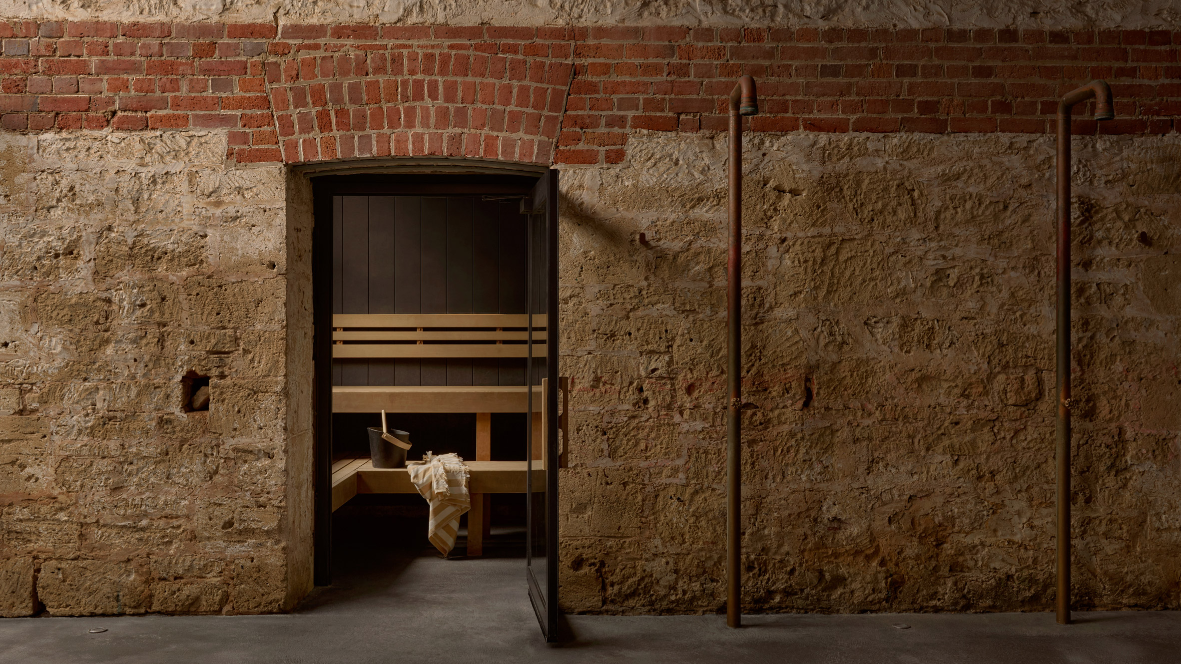 https://static.dezeen.com/uploads/2026/09/alchemy-saunas-rezen-architecture-interiors-public-leisure-australia_dezeen_2364_hero.jpg