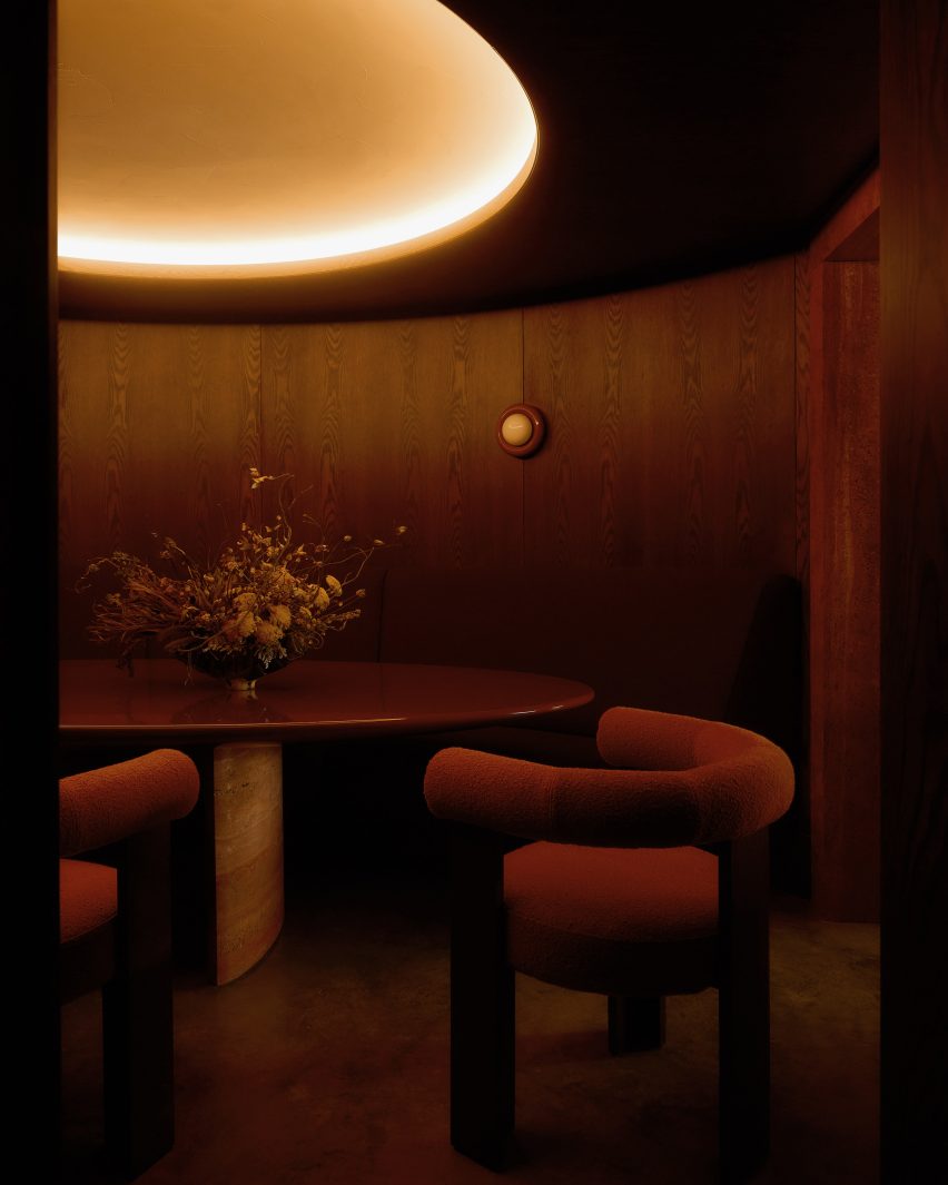 Dark timber dining room in an East Sussex home