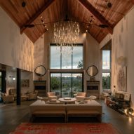 Lasvit suspends chandelier of flowers preserved in glass in Napa Valley home