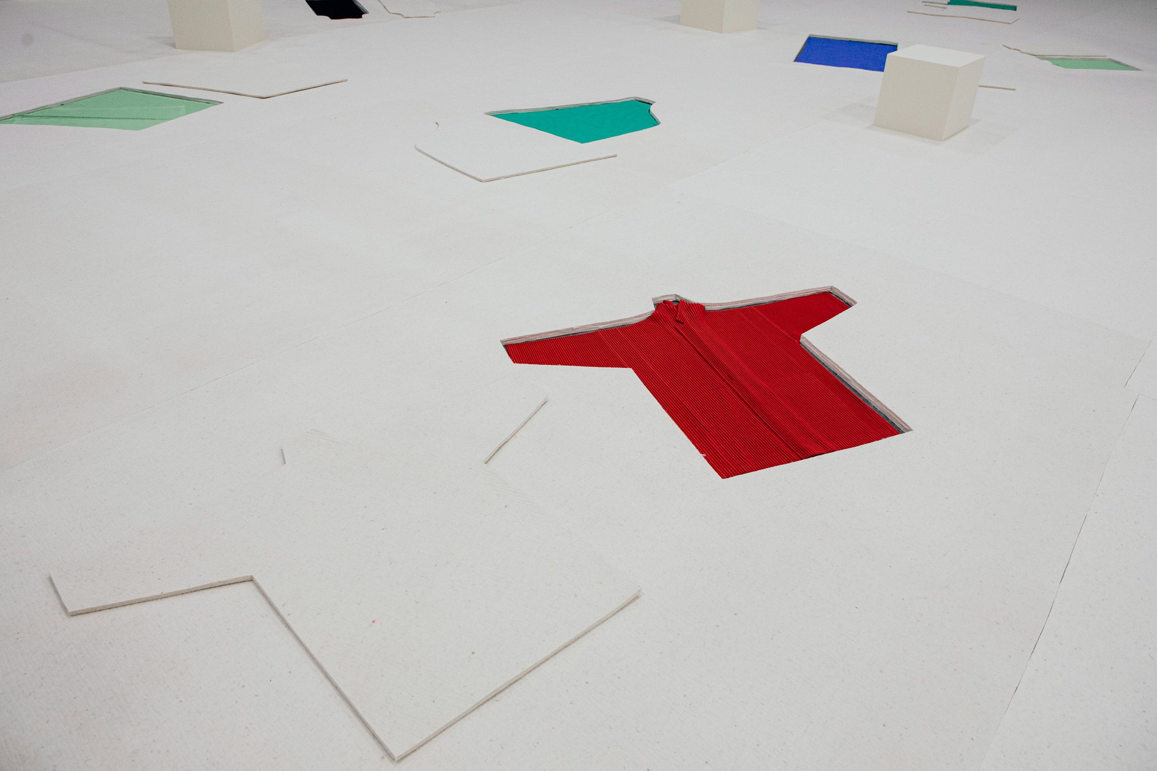 Clothes under felt floor