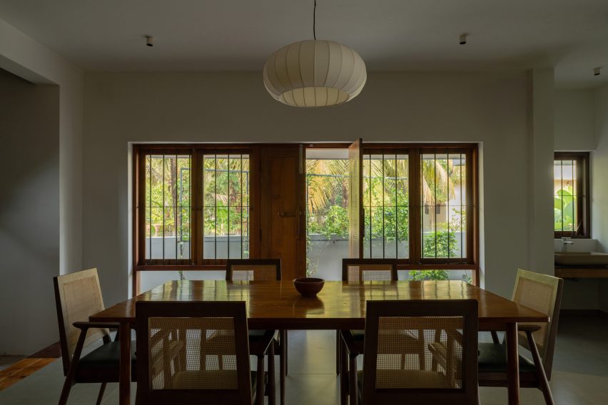 Dining room interior at House Beyond the Mango Trees by InLe Architects