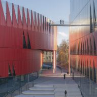 Red facade "evoking a hedgehog" wraps ice hockey arena by Chyb&iacute;k + Kri&scaron;tof