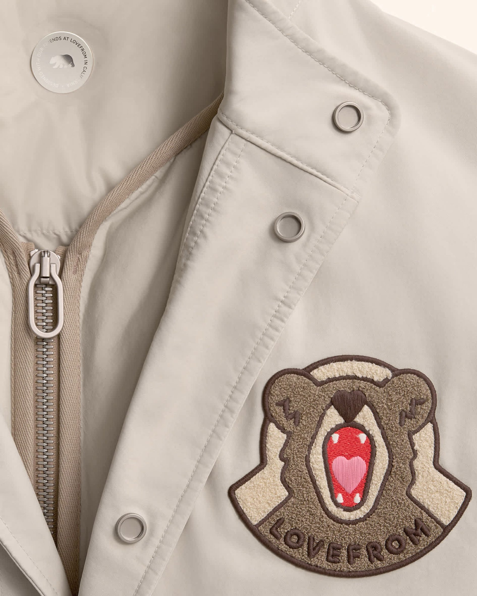 Jacket with bear patch