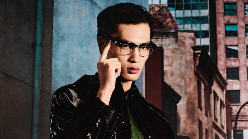Photo of a man wearing the Meta Ray-Ban Audio glasses in the partially wire-frame Clubmaster model