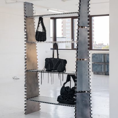 Shelf with rivets