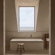 Merckx-Holvoet Architecten designs seaside penthouse to evoke North Sea coast