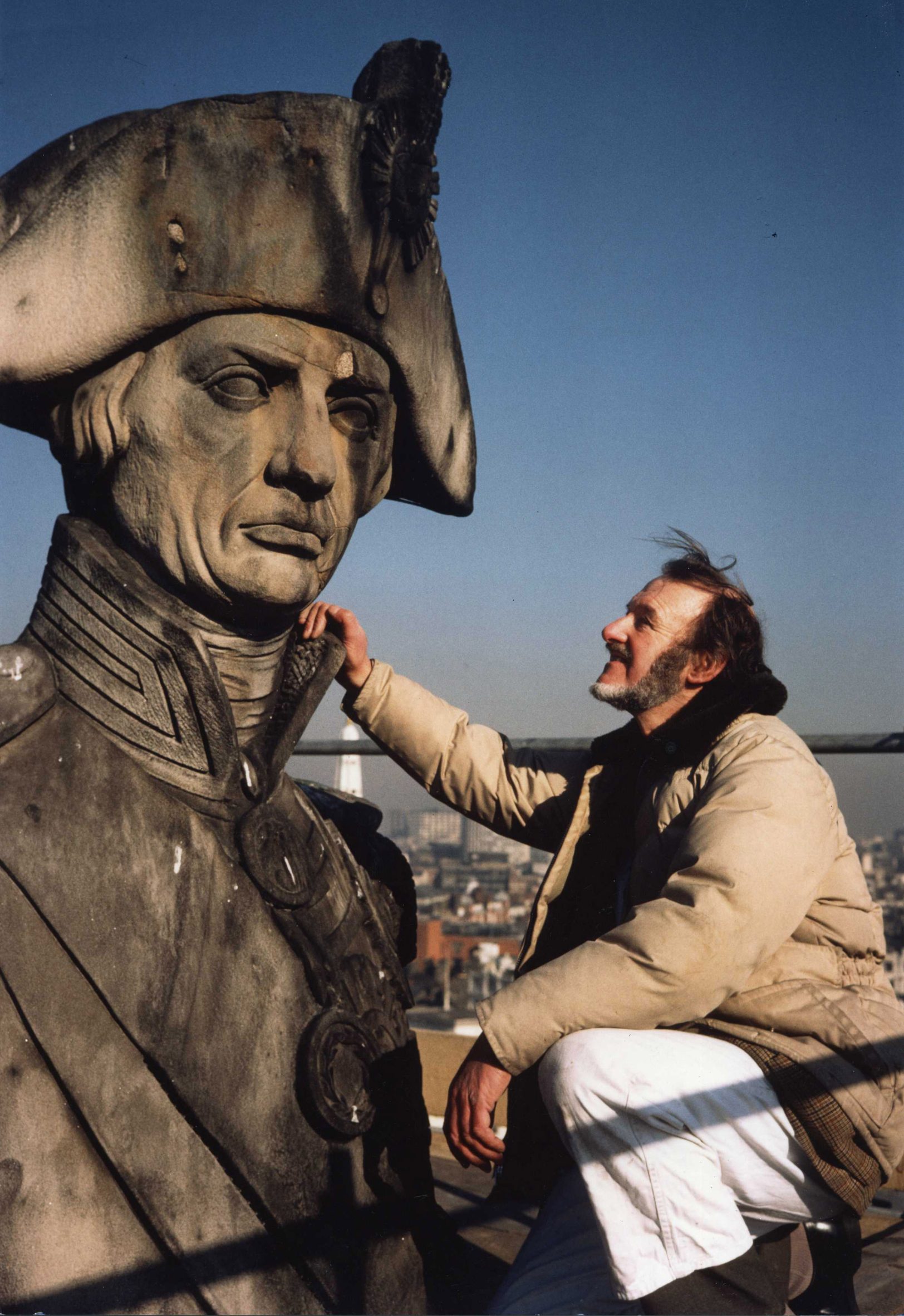 Donald Insall looking at Nelson's statue