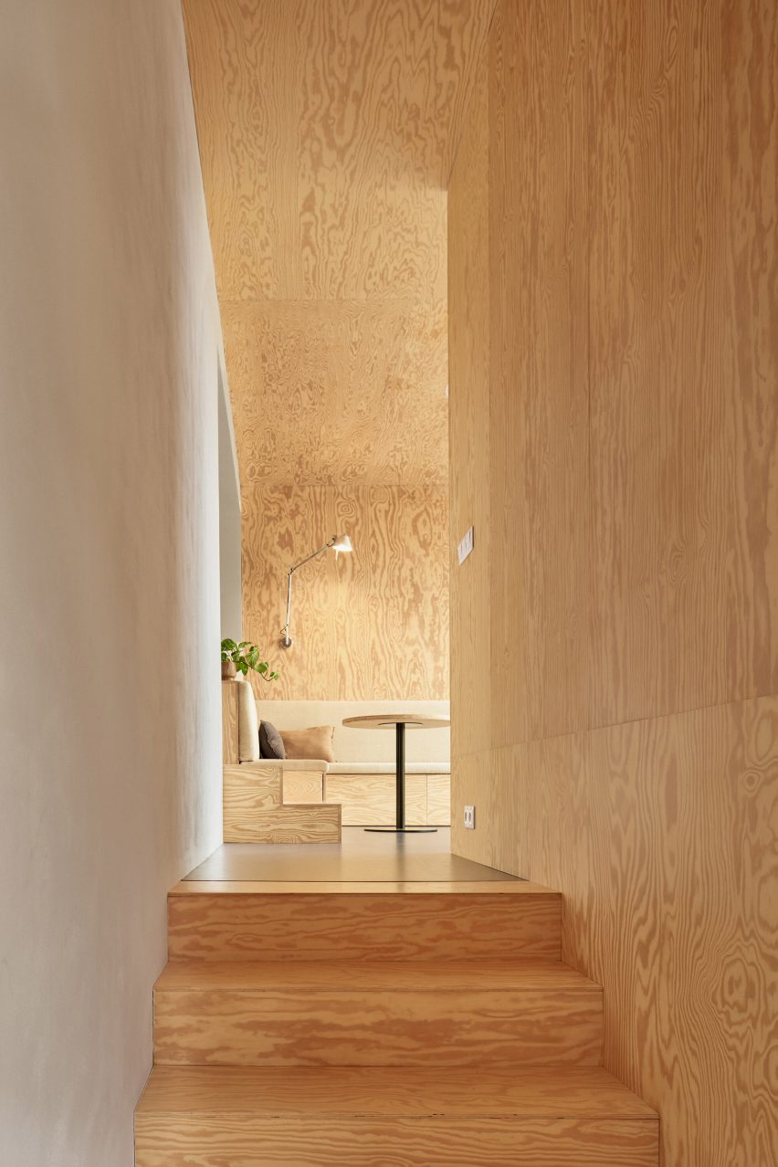 pine cladding covers stairs, walls and ceiling in this newly developed Czech home