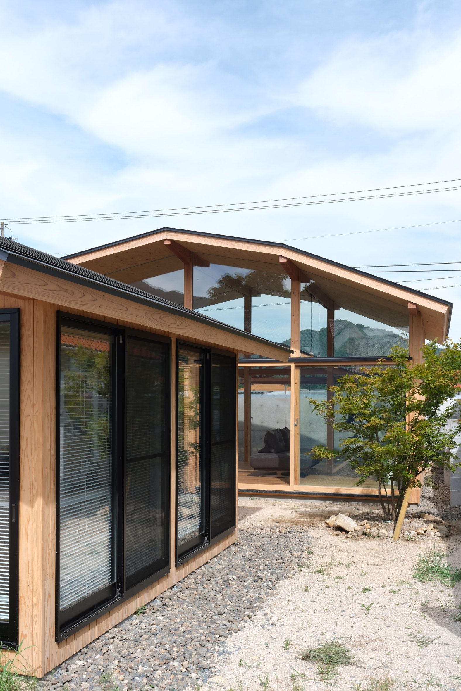House in Yakami by Enter-Archi
