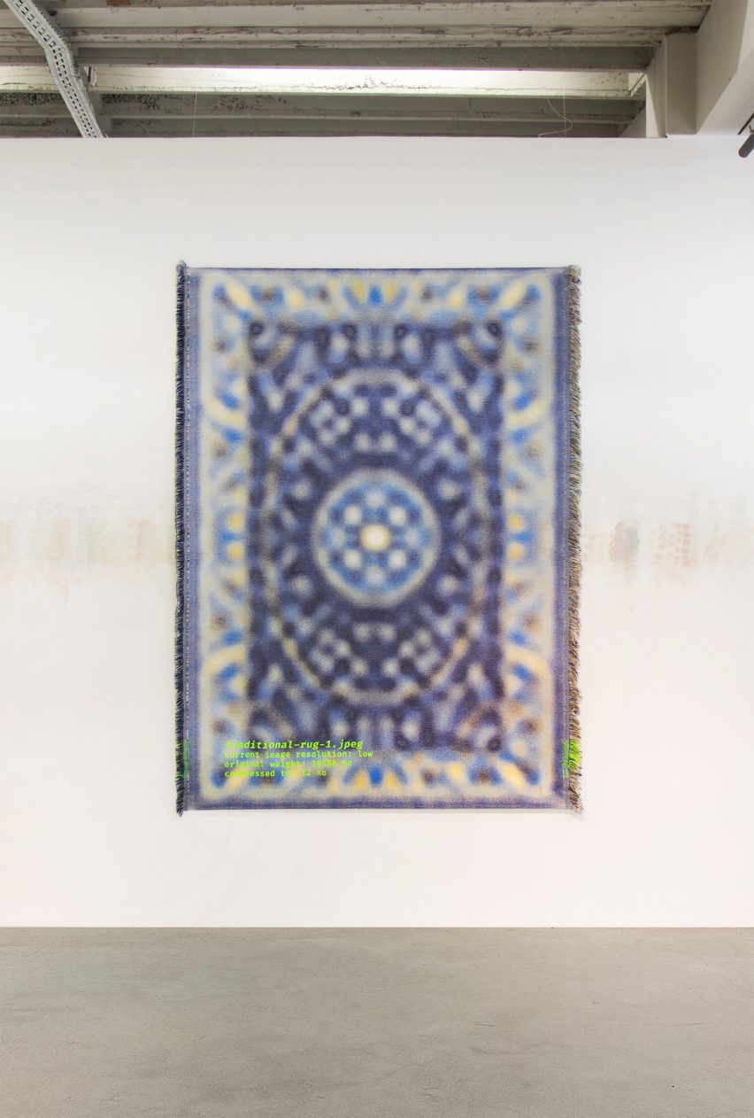Blurry Persian-style rug hung on white wall