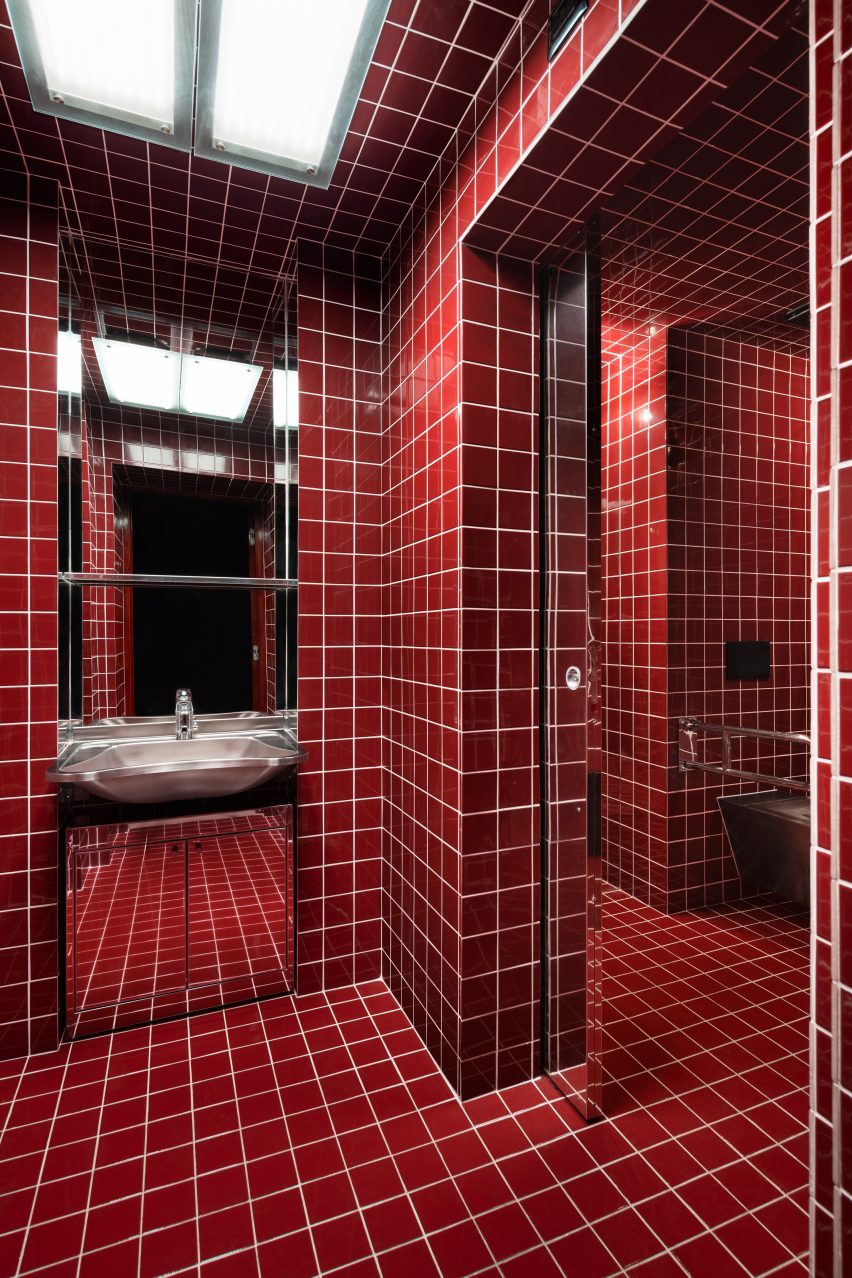 Bright red-tiled bathroom