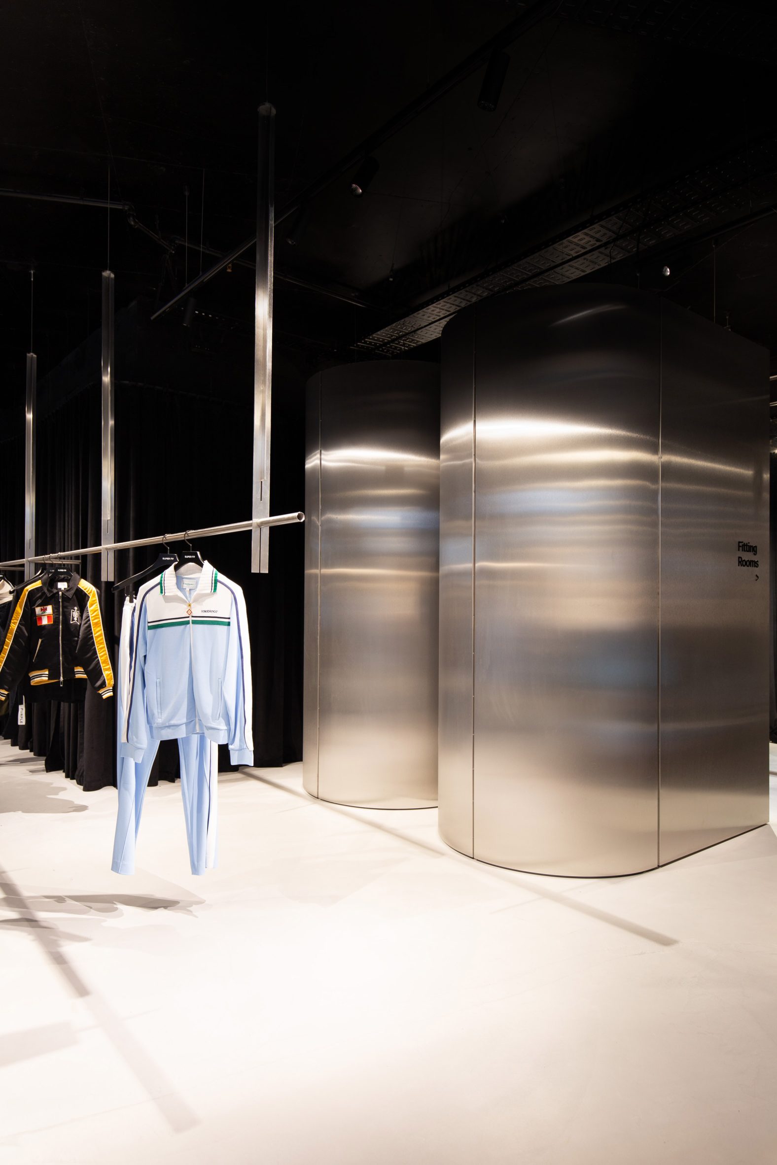 Curved steel fitting rooms