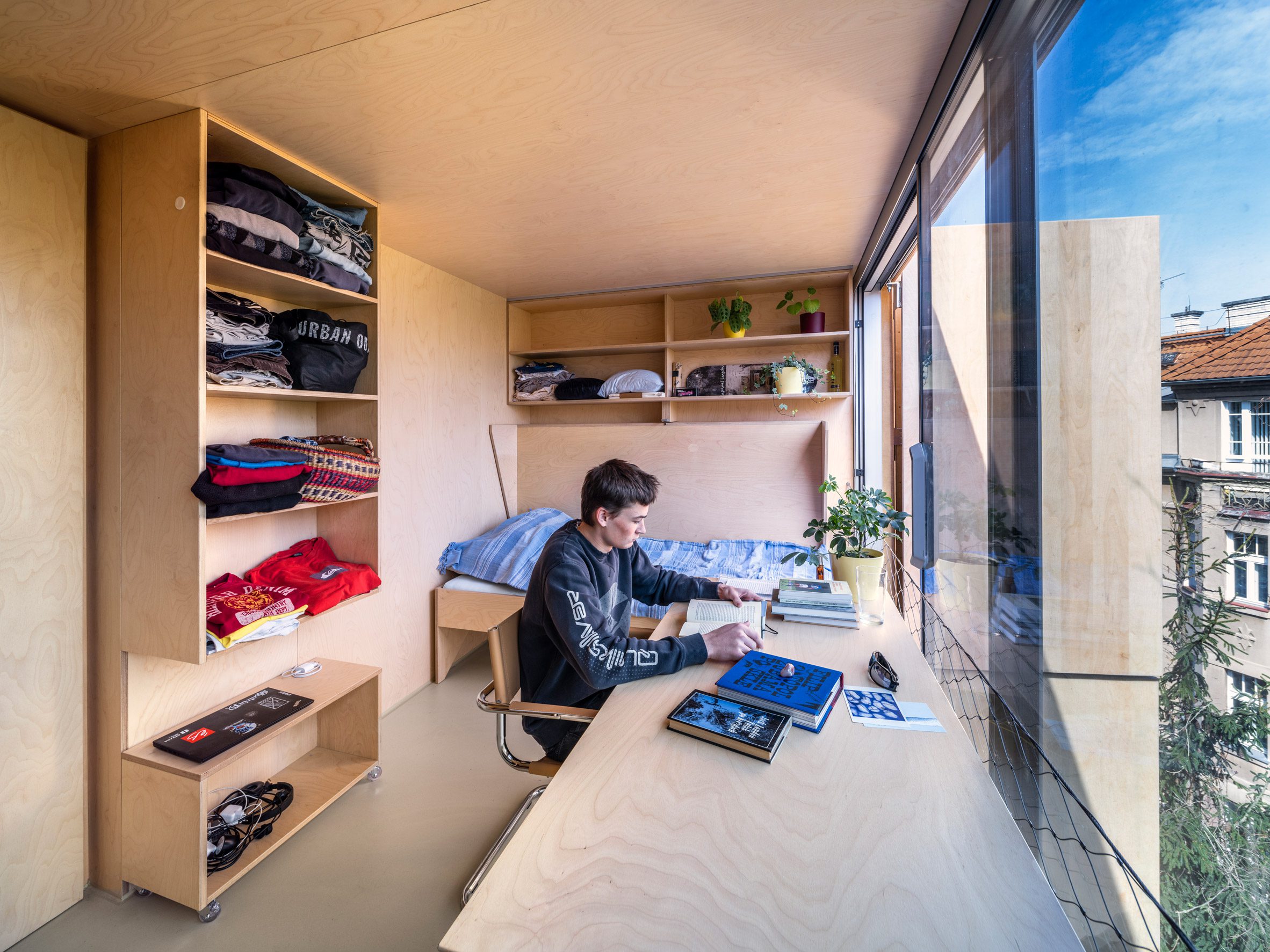 Plywood-lined bedroom